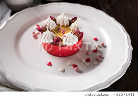 Caramel cheesecake with cream and flowers on the wooden background Caramel cheesecake with cream and flowers on the wooden background 81571411