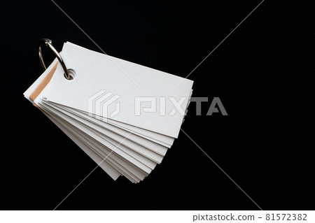 Blank ring memo on black background Blank ring memo on black background 81572382