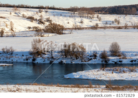 winter russian riverside wiew under direct evening sunlight winter russian riverside wiew under direct evening sunlight 81572829