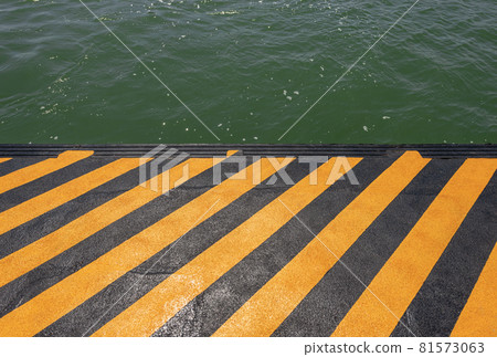 Orange and Black Quay of a Ferry Boat Station in Venice Lagoon Italy 81573063
