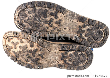 dirty used worn out black outdoor sneakers sole isolated on white 81573677