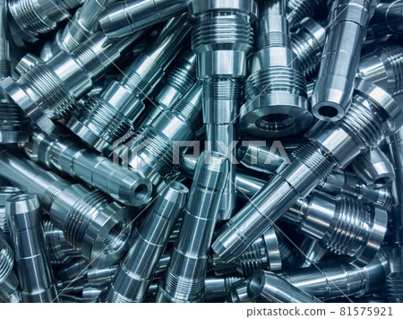 shiny steel parts background, a pile of long steel rods after modern fine cnc turning cut 81575921