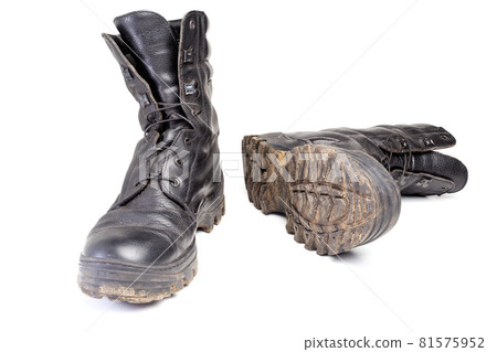 used dirty and dusty military black boots isolated on white back used dirty and dusty military black boots isolated on white back 81575952