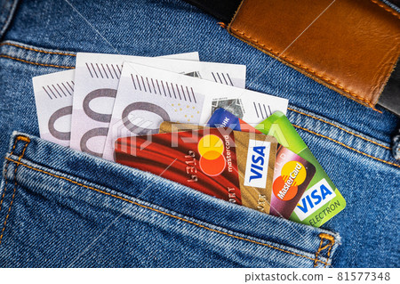debit and credit cards of international payment systems visa and master cards with euro banknotes debit and credit cards of international payment systems visa and master cards with euro banknotes 81577348