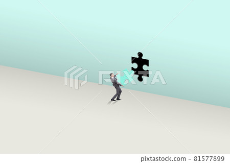 Businessman putting missing jigsaw puzzle piece Businessman putting missing jigsaw puzzle piece 81577899