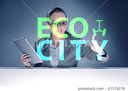 Ecocity ecology concept with businesswoman 81579276