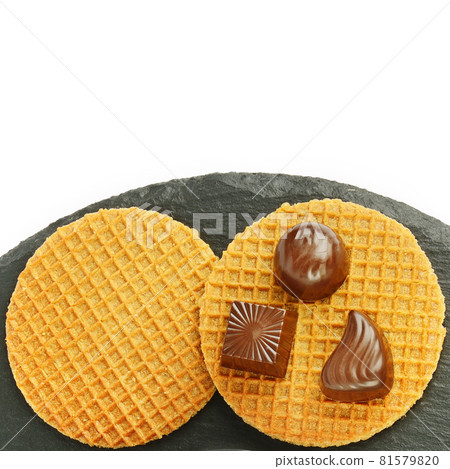 Belgian waffles and chocolate pralines isolated on white . Top view. Flat lay. 81579820