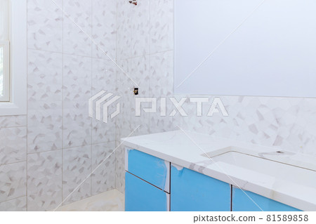 Renovation construction of master bathroom with new under construction bathroom interior drywall ready for tile Renovation construction of master bathroom with new under construction bathroom interior drywall ready for tile 81589858