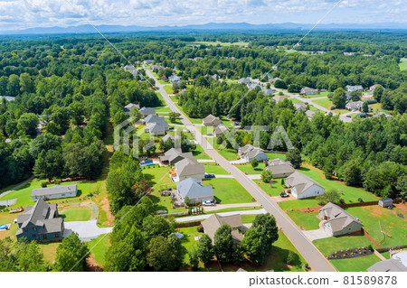 Aerial view of a small sleeping area of roofs the houses on urban landscape Boiling Springs town in South Carolina US 81589878