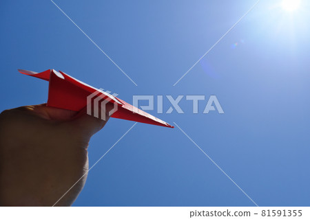 Paper plane illuminated by the sun Paper plane illuminated by the sun 81591355