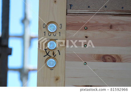 Wooden detached house construction site with earthquake-resistant hardware Wooden detached house construction site with earthquake-resistant hardware 81592966