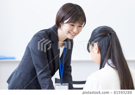 Educational image High school girls receiving one-on-one guidance Photographing cooperation: Japanese language school attached to Chuo Institute of Technology Educational image High school girls receiving one-on-one guidance Photographing cooperation: Japanese language school attached to Chuo Institute of Technology 81593289