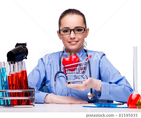 Young doctor with red heart in lab 81595035