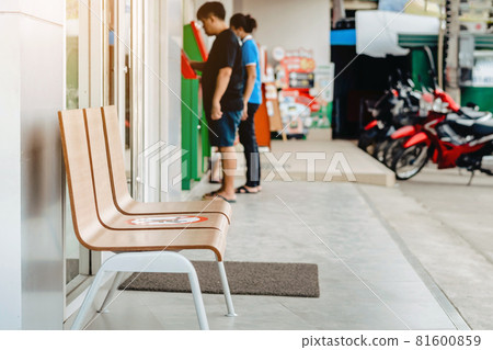 Alternative seating mark for social distance rules in front of the bank distance for one seat from other people to protect from Corona Virus(COVID-19), Social distancing for infection risk. 81600859