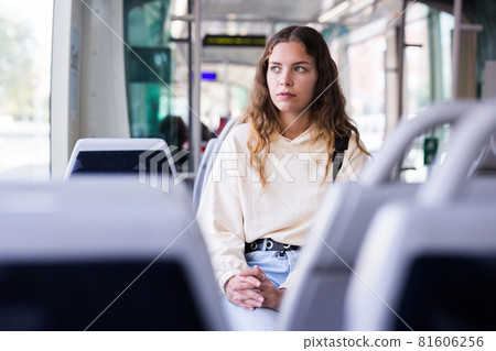 Portrait of a focused girl riding on public transport 81606256