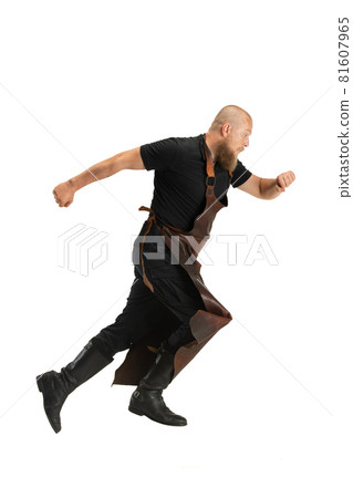 Portrait of strong bearded bald man, blacksmith wearing leather apron or uniform isolated on white studio background. Concept of labor, retro professions, power, beauty, humor Portrait of strong bearded bald man, blacksmith wearing leather apron or uniform isolated on white studio background. Concept of labor, retro professions, power, beauty, humor 81607965