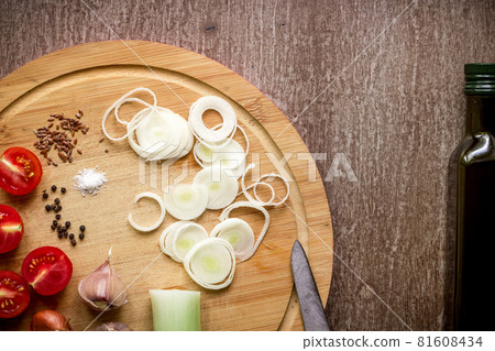 Fresh organic ingredients for salad making: spinach, tomatoes, sprouts, basil, olive oil on rustic background, top view. Fresh organic ingredients for salad making: spinach, tomatoes, sprouts, basil, olive oil on rustic background, top view. 81608434