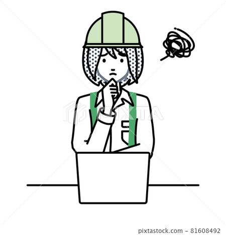 一位坐在辦公桌前打開電腦時遇到麻煩的建築工地婦女 一位坐在辦公桌前打開電腦時遇到麻煩的建築工地婦女 81608492
