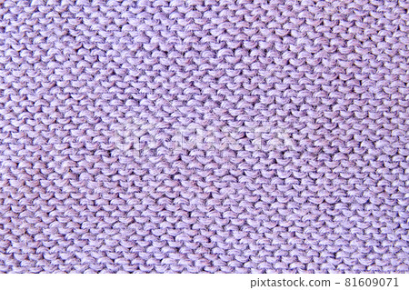 Violet or purple knitted textured background. Closeup Violet or purple knitted textured background. Closeup 81609071