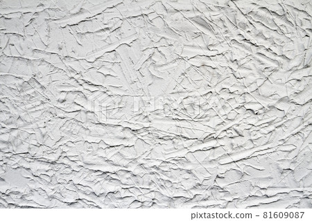 Decorative gray plaster effect on wall. Plaster texture Decorative gray plaster effect on wall. Plaster texture 81609087