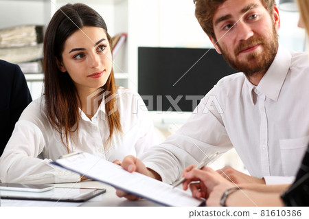 Group of people sit in office deliberate on problem 81610386