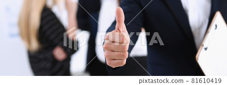 Handsome smiling man showing OK or approval sign Handsome smiling man showing OK or approval sign 81610419