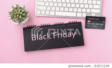 Black friday sale concept with credit card and computer keyboard on pink background Black friday sale concept with credit card and computer keyboard on pink background 81611236