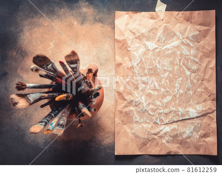 Paint brush as art painter tool on abstract background texture. Paintbrush and piece of paper 81612259