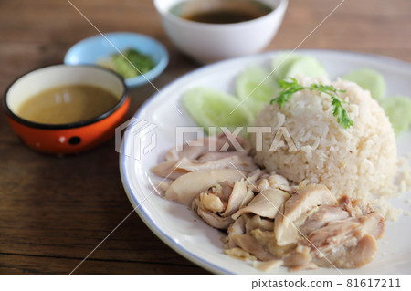 Thai food gourmet steamed chicken with rice on wood background Thai food gourmet steamed chicken with rice on wood background 81617211