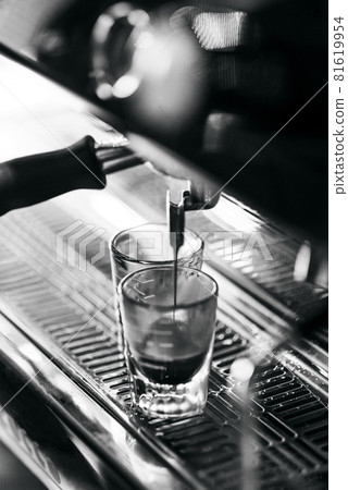 making espresso coffee close up detail with modern machine making espresso coffee close up detail with modern machine 81619954