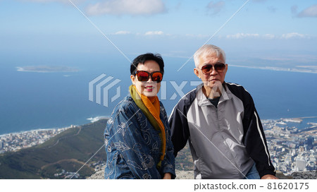 Asian senior elderly travel to South Africa on peak top of table 81620175