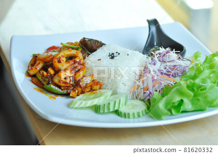 stir fried seafood with rice, stir fried squid and shell stir fried seafood with rice, stir fried squid and shell 81620332