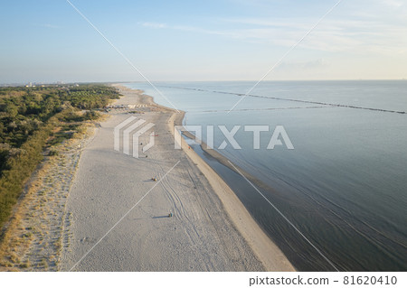 wonderful view of sandy beach with umbrellas and adriatic sea 81620410