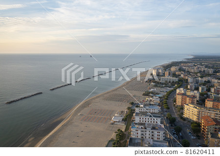 nice view of sandy beach with umbrellas and adriatic sea 81620411