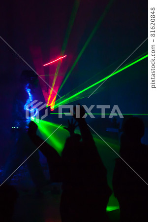 Colorful lights show. Laser show in motion in dark Colorful lights show. Laser show in motion in dark 81620848