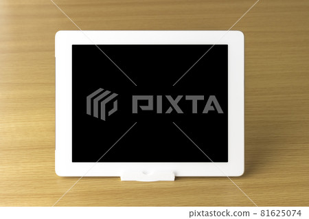 Tablet terminal standing on the table Tablet terminal standing on the table 81625074
