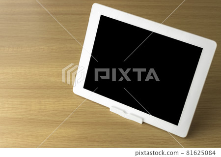 Tablet terminal standing on the table Tablet terminal standing on the table 81625084