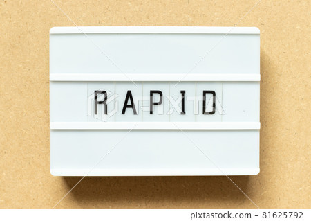 Lightbox with word rapid on wood background Lightbox with word rapid on wood background 81625792