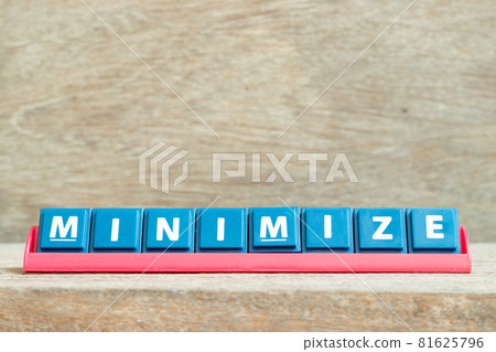 Tile alphabet letter with word minimize in red color rack on wood background Tile alphabet letter with word minimize in red color rack on wood background 81625796
