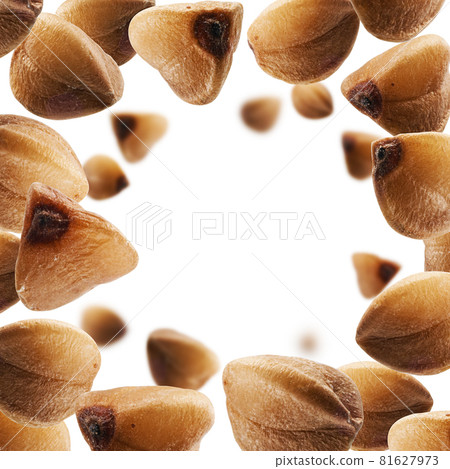 Ripe buckwheat grains levitate on a white background Ripe buckwheat grains levitate on a white background 81627973