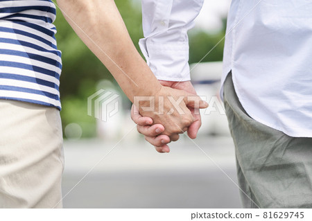 A good middle-aged couple holding hands A good middle-aged couple holding hands 81629745