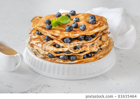 Crepes with fresh blueberries 81635464