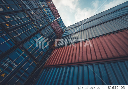 Cargo container for overseas shipping on high stack look up from ground Cargo container for overseas shipping on high stack look up from ground 81639403