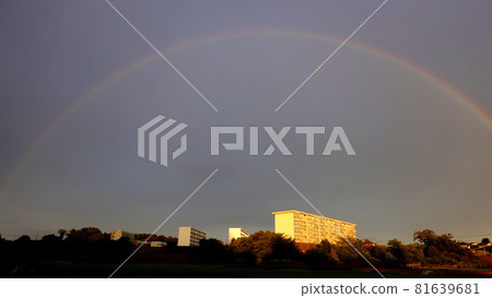 A big rainbow in the evening at the end of summer A big rainbow in the evening at the end of summer 81639681