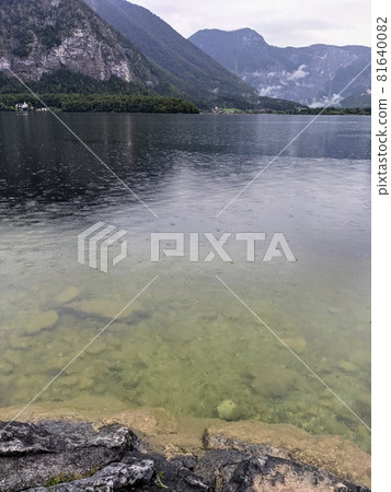 Alpine lake Hallstatter See during rain calming scene Alpine lake Hallstatter See during rain calming scene 81640082