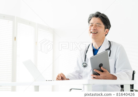 Doctor middle man white coat scrub medical examination 81640426