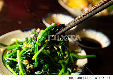 Stir-fried water spinach with peanuts Asian cuisine Stir-fried water spinach with peanuts Asian cuisine 81643471