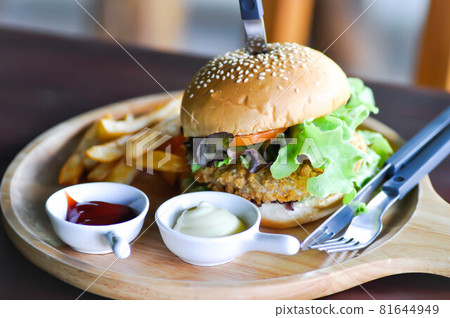 burger or chicken burger or hamburger , bun with chicken stuffed burger or chicken burger or hamburger , bun with chicken stuffed 81644949