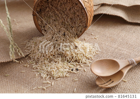 Organic raw brown rice in close up Organic raw brown rice in close up 81645131