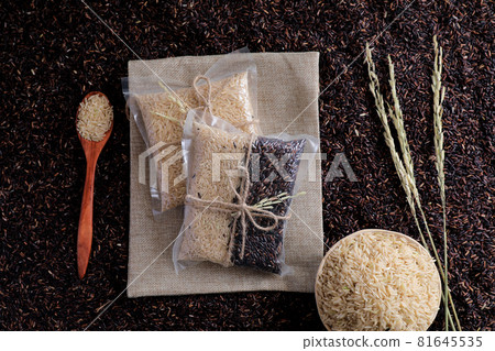 Organic raw brown rice and riceberry rice in close up Organic raw brown rice and riceberry rice in close up 81645535